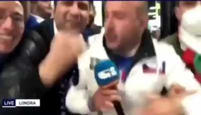 Journalist is disturbed by Italian fans.... And then he joins them