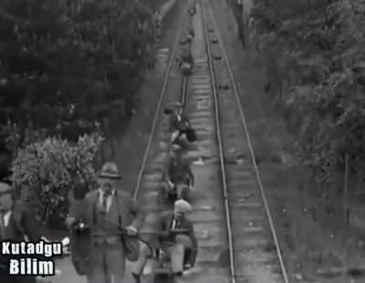 1935 quarrie workers ride the rails with this device while returning from work.
