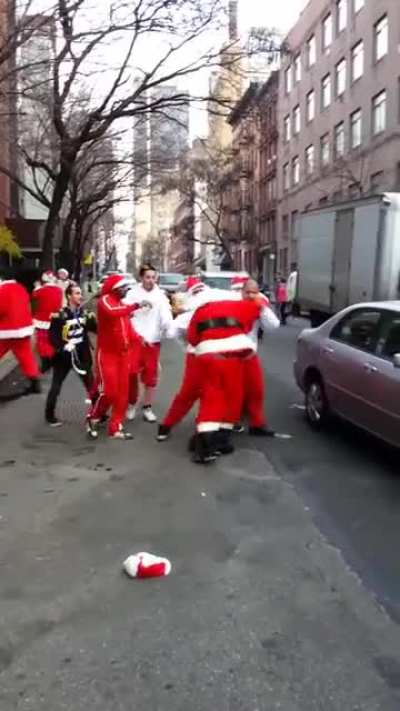 Drunk Santas. 2012 "Santacon" where Santas do a bar crawl in NYC. Things got a little out of hand in this one.