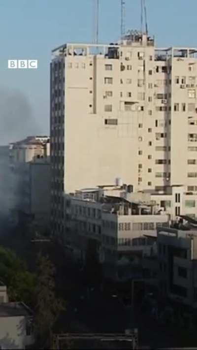 A building in Gaza City collapsed during a live BBC Arabic TV report after being hit by an Israeli strike