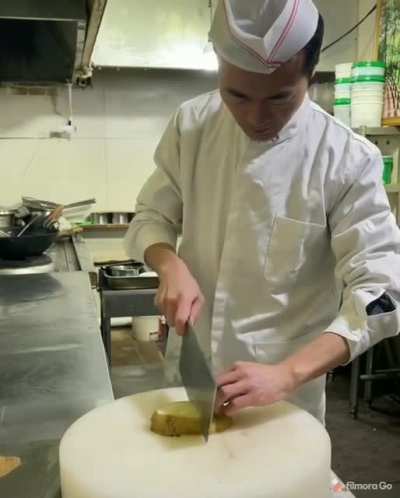 Slicing potato into a thin net