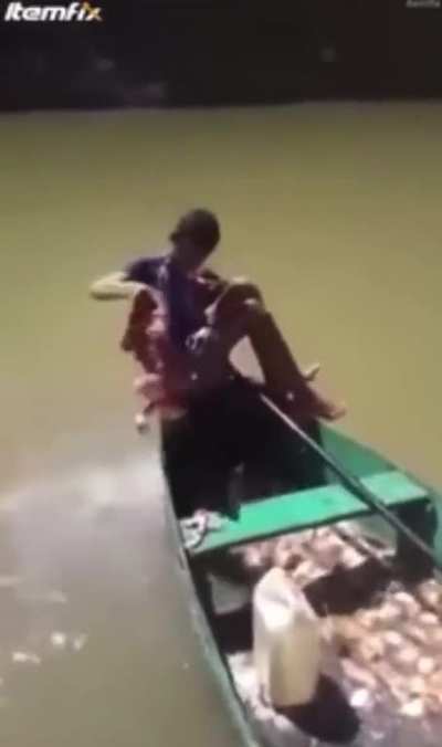 Kid fishing for piranhas using a slab of raw meat&hellip;
