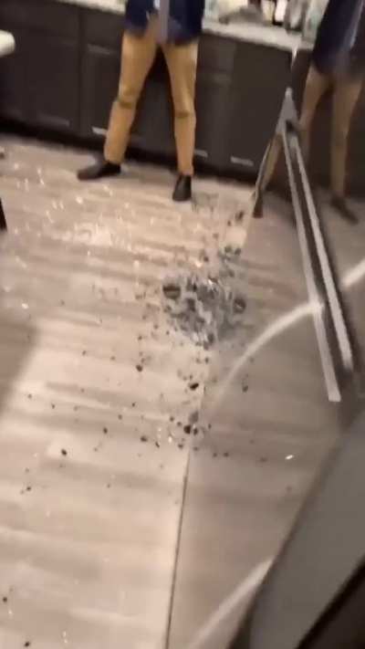 Piece of the ceramic plate broke the tempered glass.