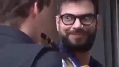Following people in public while playing popular theme songs