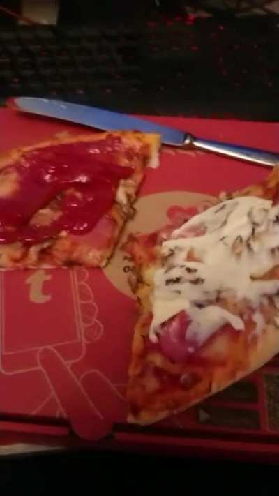 very cursed pizza with ketchup and mayonnaise