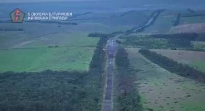 Unmanned ground vehicle of 5th assault brigade fires at russian position in the area of Zaliznyanske (NW of Bakhmut)