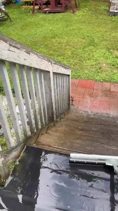 Just rained, swabbing my grandma&rsquo;s deck