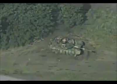 russian burning alive trying to escape out of the hatch of his  T-90MS