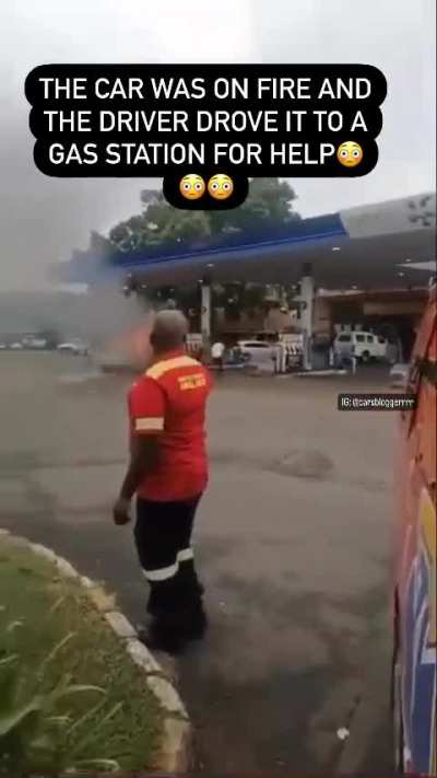 car on fire drives into gas station