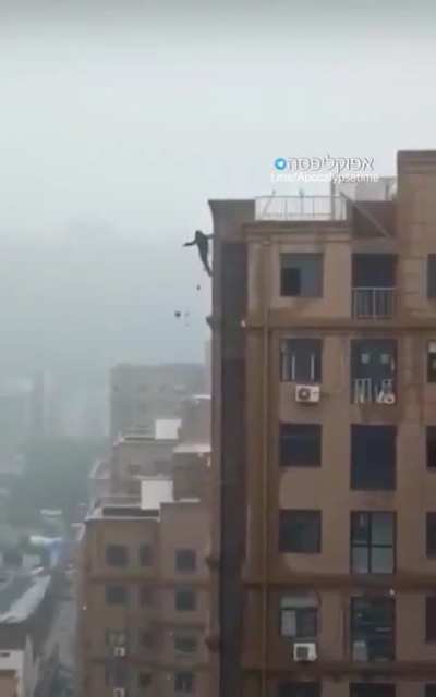 man falls off roof when trying to create a tiktok video