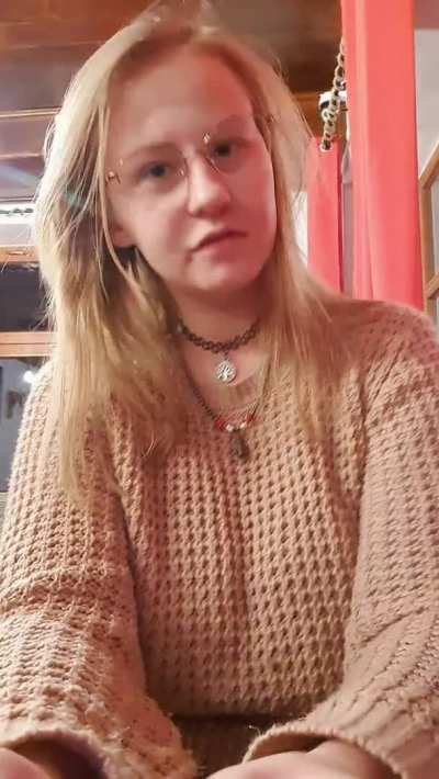 Modest girl in a modest sweater in a restaurant and under the sweater modest boobs. Kisses