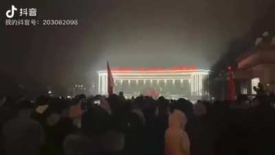 Chinese people marching to the local government building, protesting demanding the end of COVID lock down 11/25/22
