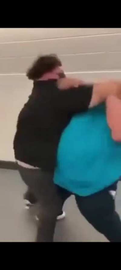 Fat kids fighting for a burger