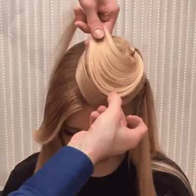 Giving new meaning to hat hair