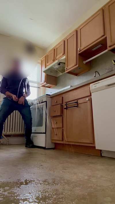 Powerpissing in the kitchen.  Love doing this so much