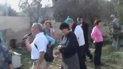 Illegal Jewish settlers arrive - in an illegally occupied Palestinian neighborhood - to check out the houses they're gonna steal.