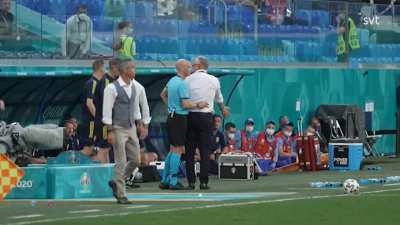 Swedens head coach Janne Andersson nutmegging polish staff during Poland vs Sweden. 