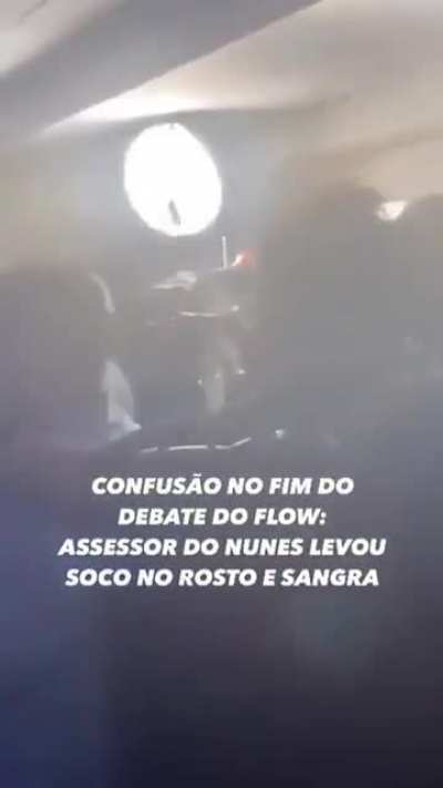 Outro &acirc;ngulo do assessor de Nunes sendo socado ap&oacute;s a expuls&atilde;o de Mar&ccedil;al do debate