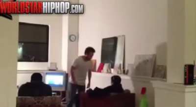 Guy harasses man chilling on the couch, gets his head slammed against the floor (turn on volume to hear all the bonks)