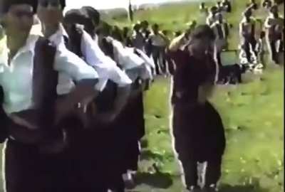 Efr&icirc;n&icirc; Kurds dancing govend with a hammer and sickle (1980)