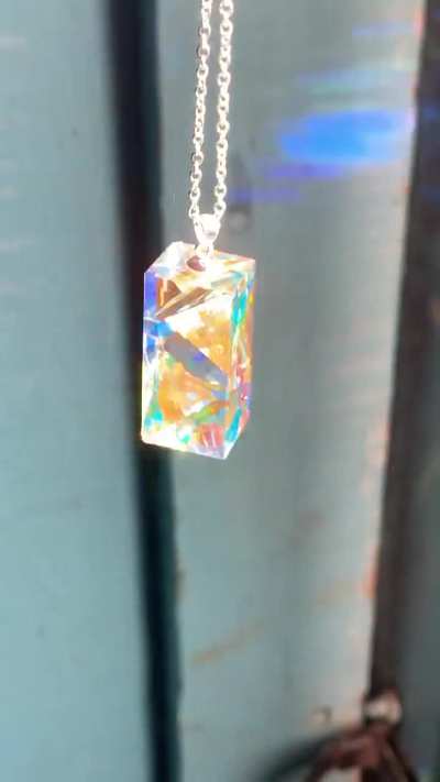 This is a sparkly glass pendant I made using dichroic glass.