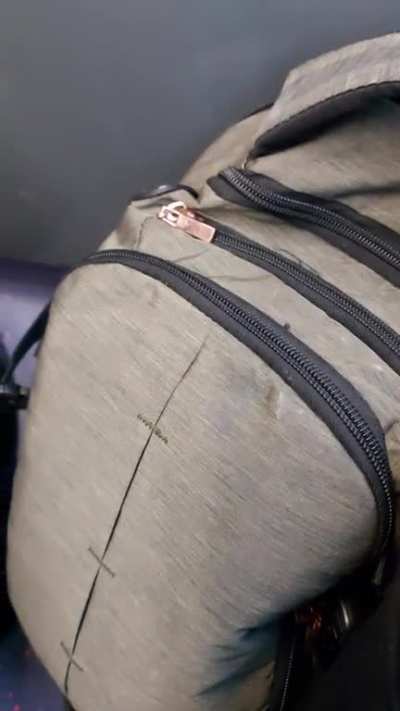 people with speakers on public transport