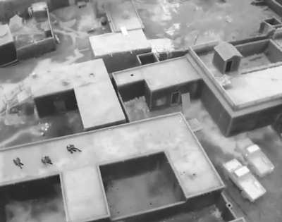 Quad Copter Footage of Pakistani FC Soldiers in combat with Baloch Insurgents hold up in a house.