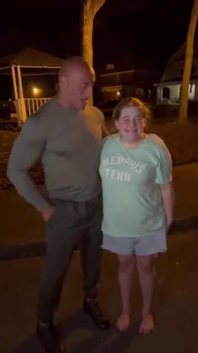 The Rock spends some time with a fan who waited over two hours to see him.