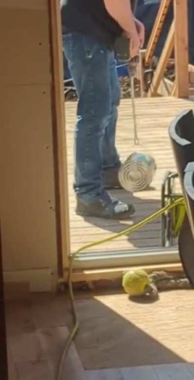 Using your custom made mixture to stir the paint