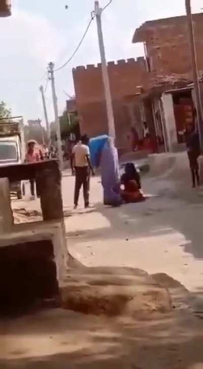 A woman was brutally beaten up by her husband in broad daylight in UP for failing to pay dowry.