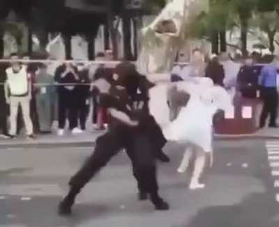 I don't know the story behind these images, but that one policeman knows what judo is