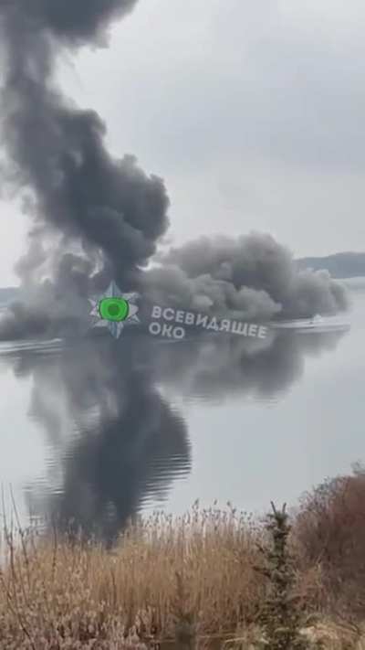Clear Video of Russian Helicopter shot down and falling into the water near Kiev, one parachute seen.