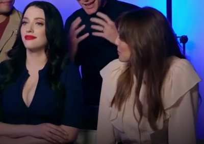 Elizabeth Olsen looking at Kat Dennings like all of us