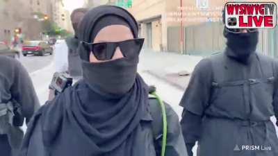 Group of black bloc threaten a streamer for filming a George Floyd/BLM protest at the Los Angeles DA office, saying "I've been looking for your bitch ass, I'm gonna fuck you up"