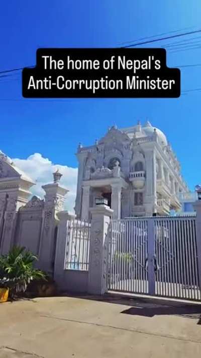 Why corrupt Nepalese official private house have their "Van Su Nhu Y" Vietnamese sign on their gate?