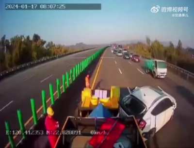Two vehicles crash into a construction truck