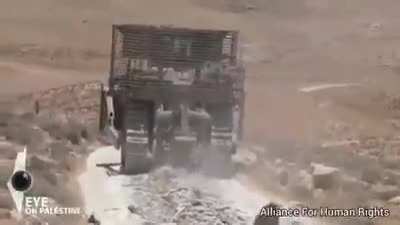Israeli occupiers destroy roads connecting more than 17 Palestinian villages in Masafer Yatta, before bulldozing their only water pipelines via swilkinsonbc on twitter