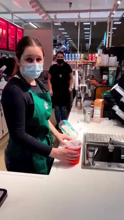 Man throws drinks at employeess