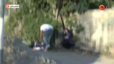The moment when the Palestinian journalist and correspondent of Al Jazeera channel Shireen Abu Akleh got shot and killed by the Israeli occupation forces in Jenin this morning, May 11, 2022