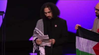 Palestinian director Abdallah Alkhatib wins at Berlinale for his film "Chronicles From the Siege". Alkhatib addresses the festival's political censorship &amp;amp; the German government's complicity in the genocide.