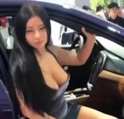 Vietnamese Model Nipple Tease at Vietnam Car Show - GIF
