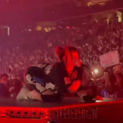 Billie Eilish on her knees
