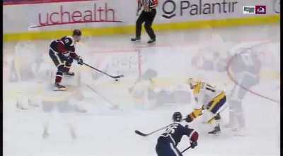 David Rittich slams into the crossbar while catching puck