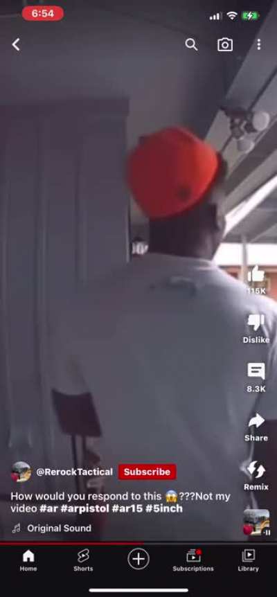 Man on ring doorbell holding gun