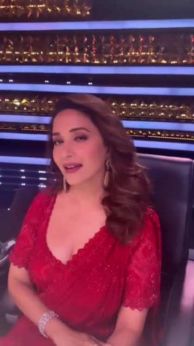 Madhuri Dixit giving a closer view of cleavage