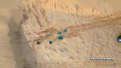 Cybertruck jumps a sand dune: tire liner, sound dampening, airbox, hood, windshield, front bumper, radiator all gone