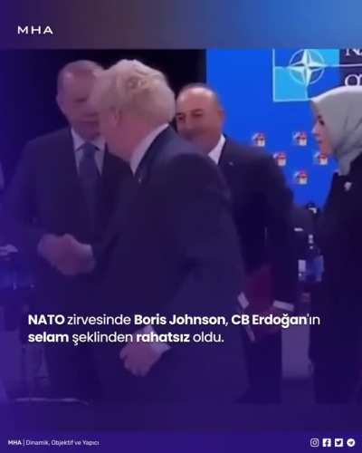 NATO zirvesinde Boris Johnson,CB Erdoğan'ın selam seklinden rahatsız oldu.