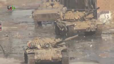 Mixed Syrian Army BMP-2/T-72 column operates in Daraya - 1/17/2013