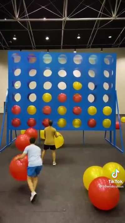 Connect four with big balloon balls
