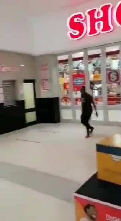 Pouring oil to stop looters